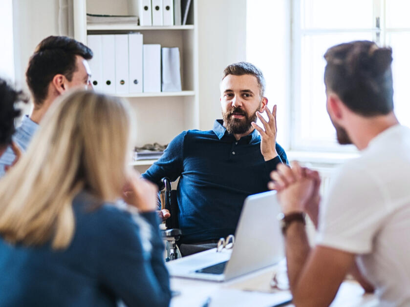 Founders in a small peer group reviewing business decisions, sharing experience, and comparing what works and what doesn’t in US go-to-market